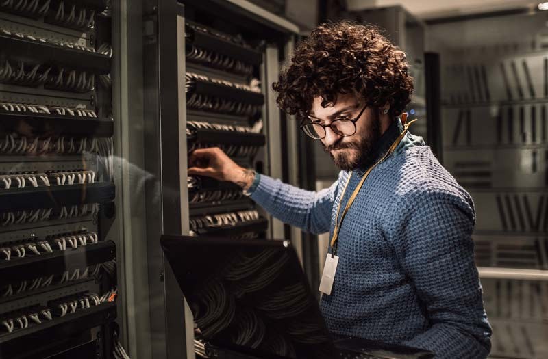 Network engineer in server room